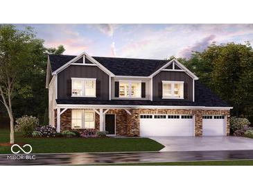 Charming two-story home features a brick facade, three-car garage, and manicured lawn at 540 Galveston Ln, Westfield, IN 46074
