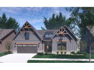 Charming home with grey siding, timber accents, and a welcoming front entrance at 1463 Crosstie Cir, Westfield, IN 46074