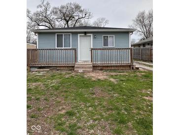 Charming home with a inviting front porch and light blue siding at , Indianapolis, IN 46221