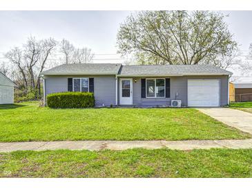 Charming single-story home with a well-maintained lawn and a cozy, inviting exterior at 6124 Dry Den Ct, Indianapolis, IN 46221