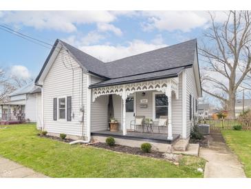 Charming home with a cozy front porch, decorative trim, and a well-maintained lawn at 508 Mount St, Greenfield, IN 46140