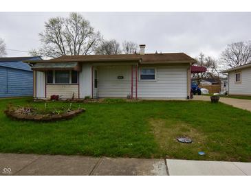 Charming single-story home featuring a well-maintained lawn and cozy curb appeal at 7367 Parkside Dr, Indianapolis, IN 46226