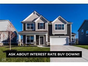 Beautiful two-story home with gray siding, a well-manicured lawn, and a two-car garage at 4068 Bozeman Way, Bargersville, IN 46106