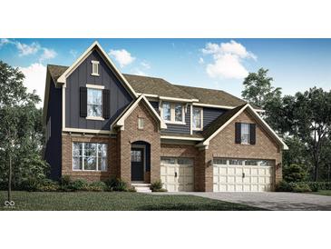 Charming two-story brick home featuring a gabled roof, attached two-car garage, and manicured lawn at 11683 Aubrey Ln, Fishers, IN 46040