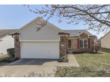 Charming single-story home with a brick and gray siding exterior and attached two-car garage at 855 Queensgate Dr, Greenwood, IN 46143