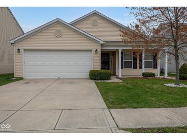 Charming single-story home with a well-manicured lawn and attached garage, perfect for suburban living at 12722 Brady Ln, Noblesville, IN 46060
