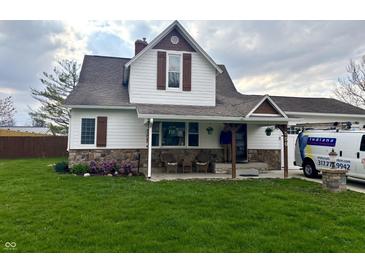 Charming two-story home features a stone foundation, updated siding and trim, and a welcoming front porch at , Cicero, IN 46034