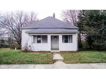 Charming single-story home with a covered front porch and freshly cut green lawn at 1303 S Shipley St, Muncie, IN 47302