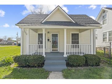 Charming single-story home with a covered porch and well-maintained landscaping at 282 N Vine St, Plainfield, IN 46168