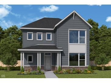 Charming two-story home with gray siding, a covered porch, and professionally landscaped front yard at 798 James William Ln, Westfield, IN 46074