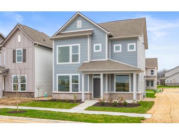 Charming two-story home featuring a covered porch and light-blue horizontal siding at 799 Rose Garden Way, Westfield, IN 46074