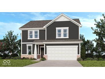 Beautiful two-story home featuring modern siding, a two-car garage, and manicured landscaping at 1038 Stubble Run, Danville, IN 46122