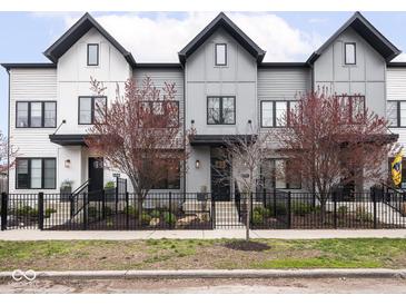 Charming townhomes boast modern architecture, black framed windows and beautiful landscaping at 1326 E 10Th St, Indianapolis, IN 46202