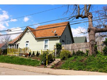 Charming home featuring updated roof, siding, and landscaping at 2025 Barth Ave, Indianapolis, IN 46203