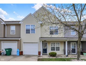Charming home featuring an attached garage and well-maintained landscaping at 503 Fayette Dr, Westfield, IN 46074