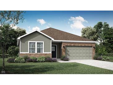 Charming single-story home with a brick and siding exterior, well-manicured lawn, and attached two-car garage at 2212 Foothill Dr, Greenfield, IN 46140
