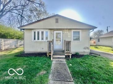 Charming single-story home with a well-maintained lawn and inviting front entrance at 301 Barton Ave, Indianapolis, IN 46241