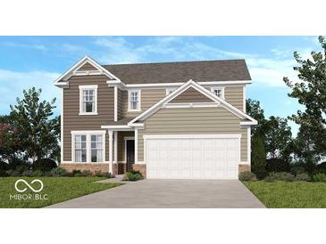 Charming two-story home with attached two-car garage, neat lawn, and traditional architectural details at 1117 Stubble Run, Danville, IN 46122
