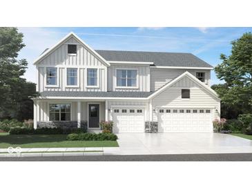 Charming two-story home featuring a three-car garage and a welcoming front porch at 3847 Thomas Jefferson Ct, Westfield, IN 46074