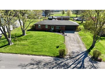 Charming single-story brick home with a well-maintained lawn and a long driveway at 1741 Terrace Ct, Franklin, IN 46131