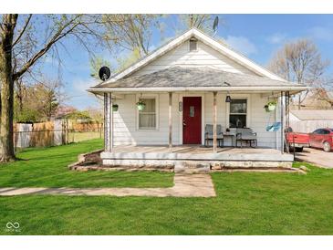 Charming single-story home with a cozy front porch and well-maintained lawn at 3414 Arbor Ave, Indianapolis, IN 46217