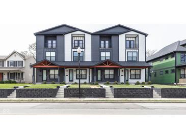 Modern two-story townhouse with black and white siding and a small front yard at 2232 Central Ave, Indianapolis, IN 46205