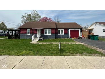 Charming single-story home with a well-maintained lawn and a driveway at 1150 Younce St, Franklin, IN 46131