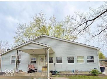 Charming single story home with covered front porch and well-maintained lawn at 13346 N Miller Dr, Camby, IN 46113