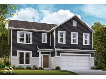 Charming two-story home featuring black siding, white brick accents, and a two-car garage, blending traditional and modern design elements at 7319 Deerberg Dr, Indianapolis, IN 46259