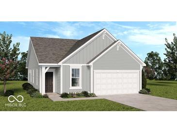 Charming single-Gathering home featuring gray siding, a two-car garage, and a well-manicured lawn at 1976 White Oak Ln, Shelbyville, IN 46176