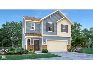 Charming two-story home boasts a two-car garage and a mix of siding and brick accents at 3733 Cantebury Dr, Franklin, IN 46131
