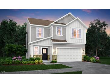 Charming two-story home with a light gray exterior, black front door, and attached two-car garage at 4548 Laughter Ln, Indianapolis, IN 46235