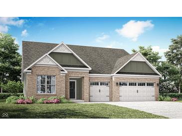 Charming brick home featuring a two-car garage and landscaped front yard, perfect for suburban living at 5095 Astor Way, McCordsville, IN 46055