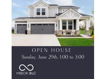 Charming two-story home featuring a three-car garage and a cozy front porch at 7158 Sugar Maple Ln, Brownsburg, IN 46112