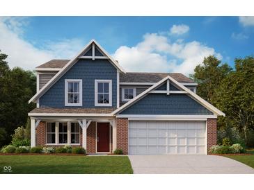 Charming two-story home with blue siding, brick accents, and a welcoming front porch at 7288 Broadview Ln, McCordsville, IN 46055