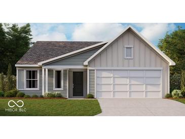 Charming single-story home featuring a gray and white color scheme, a covered entry, and an attached two-car garage at 778 Oakleaf Dr, Greenfield, IN 46140