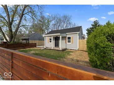 Charming single-story home with new gray siding, black roof, and a cozy front porch at 338 S Roena St, Indianapolis, IN 46241