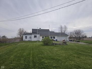 Charming single-story home with green lawn at 1152 W 375 N, Anderson, IN 46011