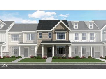 Charming two-story townhome with stone accents, vertical siding, and a welcoming entrance at 2670 Marjorie Ln, Plainfield, IN 46168