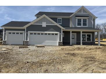 Charming new two-story home with attached two-car garage, craftsman-style columns, and appealing neutral color scheme at 2724 Glade Ave, Plainfield, IN 46168