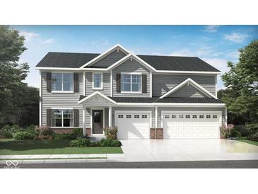 Charming two-story home with gray siding, white trim, and a three-car garage at 2738 Glade Ave, Plainfield, IN 46168