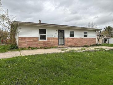 Charming single-story home with a well-maintained front yard and inviting entrance at 2632 Walker Ave, Indianapolis, IN 46203