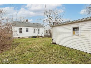 A view of the home's backyard, featuring a detached garage at 1726 N Euclid Ave, Indianapolis, IN 46218