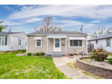Charming single-story home with a well-maintained lawn and welcoming entrance at 4203 Main St, Anderson, IN 46013