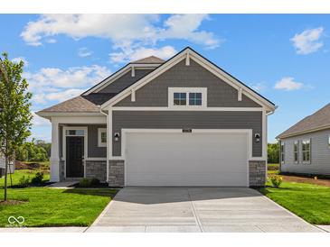 Charming single-Gathering home showcases a gray exterior, stone accents, and a spacious two-car garage at 2276 Marjorie Way, Shelbyville, IN 46176