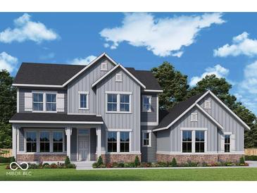 Charming two-story home featuring gray siding, dark roof, manicured lawn, and stylish architectural details at 11338 Briargate Dr, Fishers, IN 46055