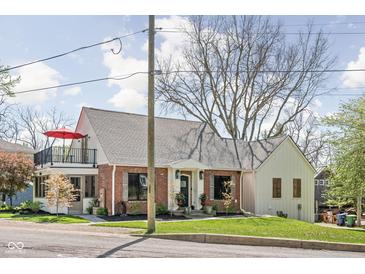 Charming brick home with balcony and landscaped yard in a desirable neighborhood at 775 W Hawthorne St, Zionsville, IN 46077