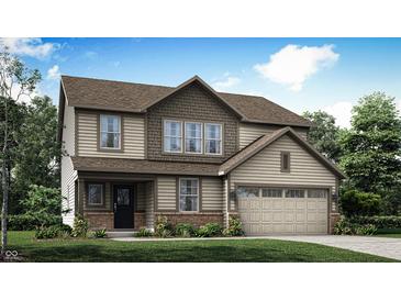 Charming two-story home with a brick foundation and an attached garage at 7236 Estes Dr, Indianapolis, IN 46239