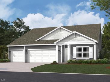 Charming single-Gathering home featuring a three-car garage and traditional architectural details at 3887 Donaldson Creek Ct, Clayton, IN 46118