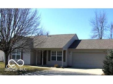 Charming single-story home featuring a well-maintained yard and attached two-car garage, providing comfort and convenience at 4036 Fairoaks Ct, Franklin, IN 46131